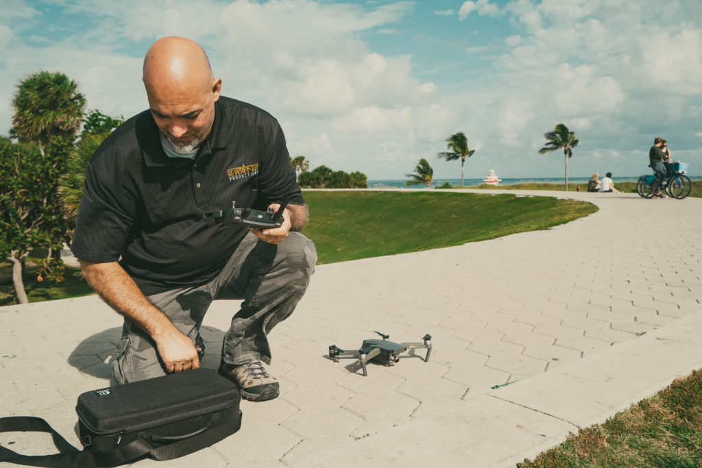 Preparing-to-fly-the-drone-on-South-Beach-1024x683