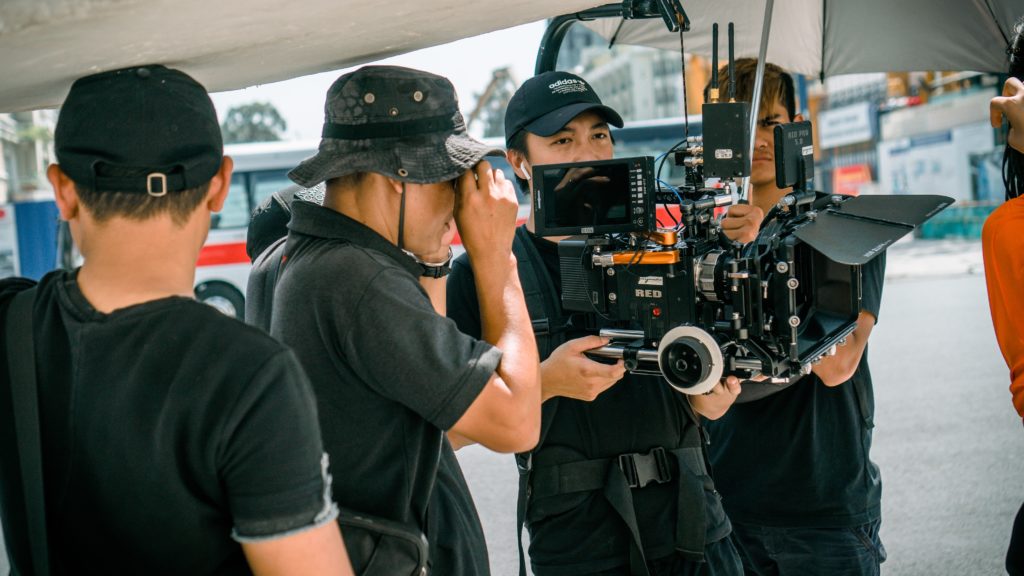 photo-of-camera-crew-standing-near-each-other-3062535-1024x576