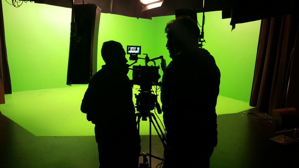 Our-Camera-Crew-setting-up-to-shoot-on-a-Green-Screen-1024x576